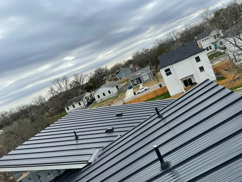 Standing seam metal roof panels with vents for Skylight Repair in Norwood